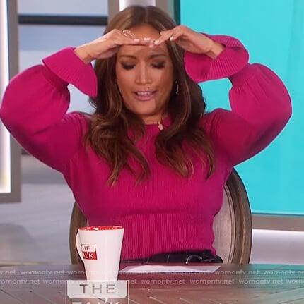 Carrie Inaba’s pink flare cuff sweater on The Talk