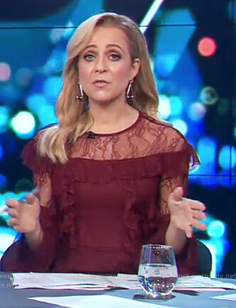 Carrie’s red lace ruffle trim dress on The Project