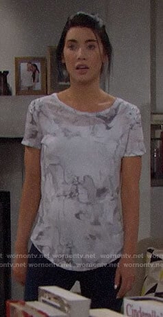 Steffy’s white marbled print tee with lace-up shoulders on The Bold and the Beautiful