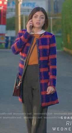 Stella's blue and red checked coat on Life Sentence