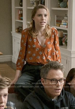 Stevie’s daisy print wrap top on Madam Secretary