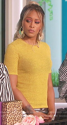 Eve’s yellow short sleeve knitted top on The Talk
