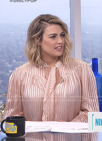 Carissa’s pink striped tie neck blouse on E! News Daily Pop