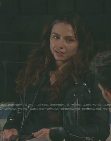 Ciara’s black floral print top and dragonfly moto jacket on Days of our Lives