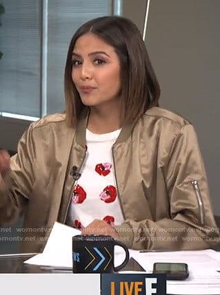 Erin’s white sequin lip t shirt on Live from E!