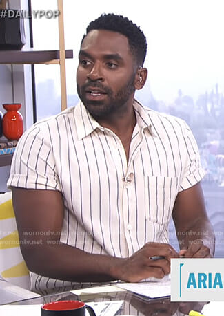 Justin’s white striped short sleeve shirt on E! News Daily Pop