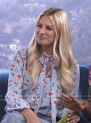 Morgan’s blue floral tie neck blouse on E! News Daily Pop