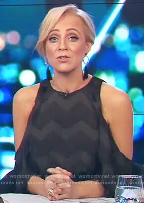 Carrie’s black cold shoulder fringe dress on The Project