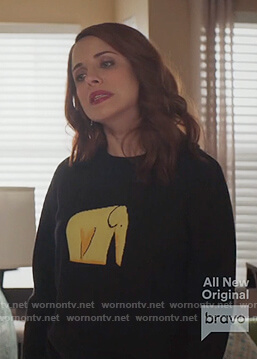 Jo’s black elephant print sweater on Girlfriends Guide to Divorce