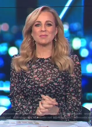 Carrie's black floral print dress on The Project