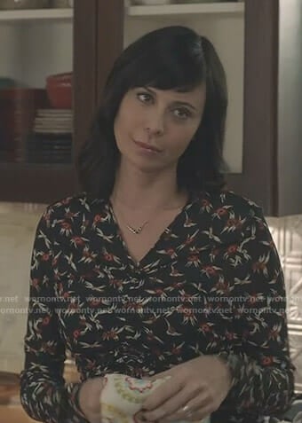 Cassie’s black floral ruched front top on Good Witch