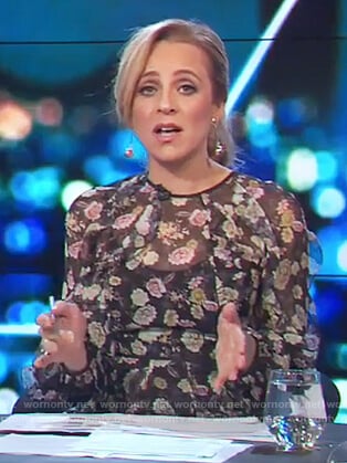 Carrie's black floral ruffle sleeve dress on The Project