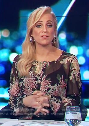 Carrie’s black floral sheer blouse on The Project