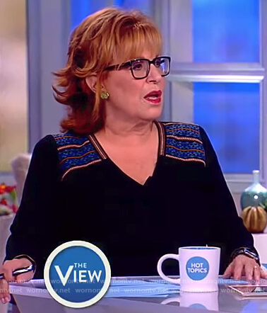 Joy’s black embroidered v-neck blouse on The View