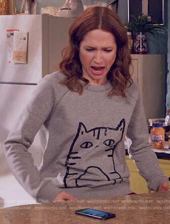 Kimmy’s gray sequin cat sweatshirt on Unbreakable Kimmy Schmidt