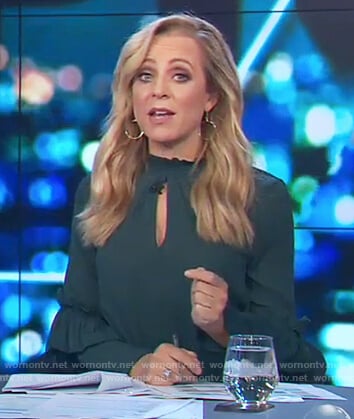 Carrie’s green keyhole ruffle top on The Project