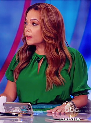 Sunny’s green puff sleeve belted dress on The View