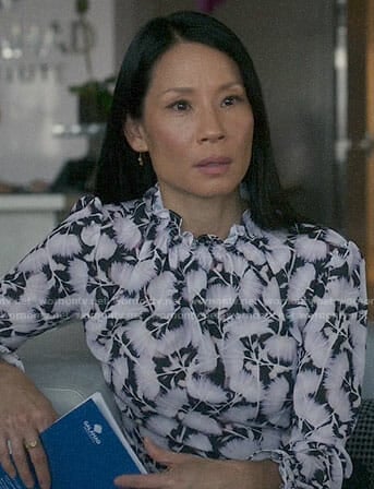 Joan's floral smocked neck blouse on Elementary