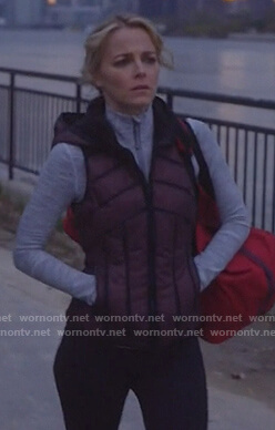 Lizzie's maroon puffer vest on Instinct
