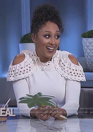 Tamera’s white cold shoulder eyelet dress on The Real