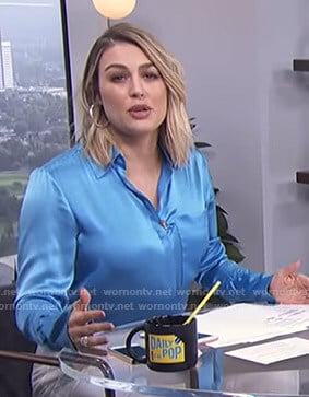 Carissa’s blue shirt with lace up cuffs on E! News Daily Pop