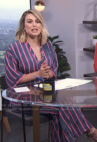 Carissa’s navy floral and striped jumpsuit on E! News Daily Pop