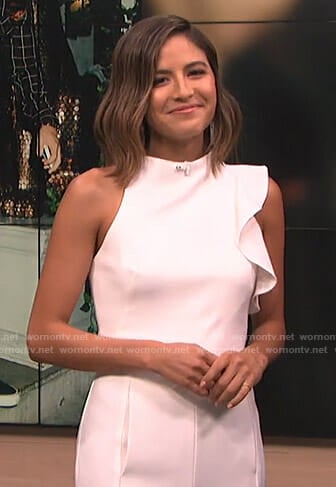 Erin's white ruffle detail jumpsuit on E! News