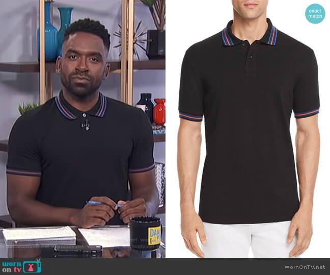 WornOnTV: Justin’s black striped polo shirt on E! News Daily Pop ...