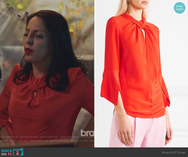 Twist-front silk crepe de chine blouse by Victoria Beckham worn by Camila Vargas (Veronica Falcón) on Queen of the South