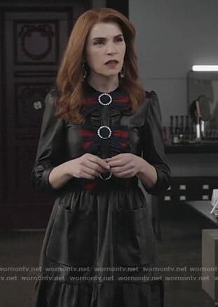 Kitty's black leather bow embellished dress on Dietland