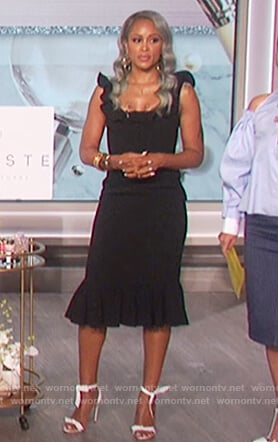 Eve’s black ruffle square neck dress on The Talk