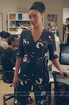 Kat's black print v-neck jumpsuit on The Bold Type