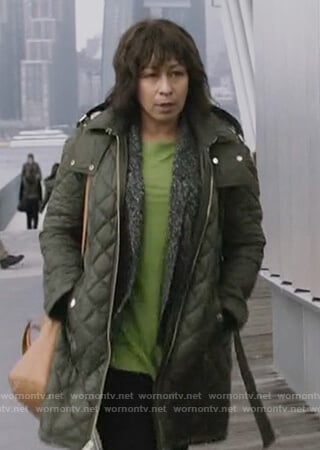 Julia’s green quilted jacket on Dietland