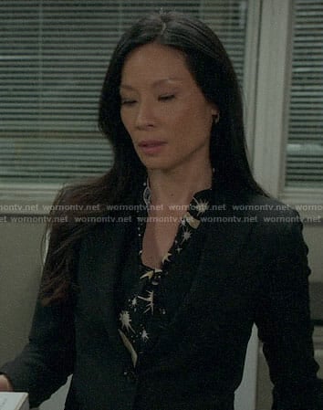 Joan's star print blouse on Elementary