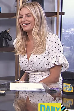 Morgan’s white polka dot top with ruffled sleeves on E! News Daily Pop