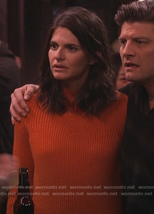 Leslie's orange mock neck sweater on Living Biblically