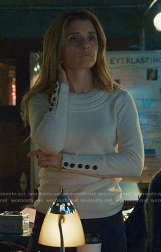 Rachel’s white sweater with braided detail on UnReal