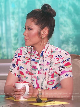 Julie’s white fish print blouse on The Talk