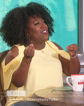 Sheryl’s yellow pleated cold shoulder top on The Talk