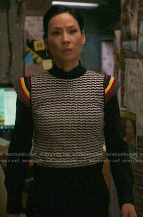 Joan's striped sleeve top on Elementary