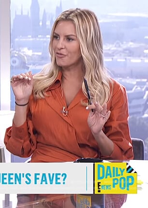 Morgan’s orange wrap blouse on E! News Daily Pop