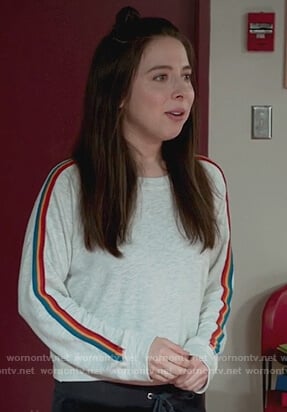 Esther’s rainbow stripe sleeve sweatshirt on Alone Together