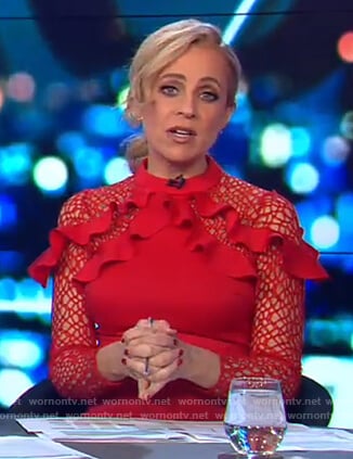 Carrie's red ruffle shoulder dress on The Project