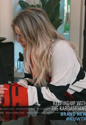 Khloe's white striped cardigan on Keeping Up with the Kardashians