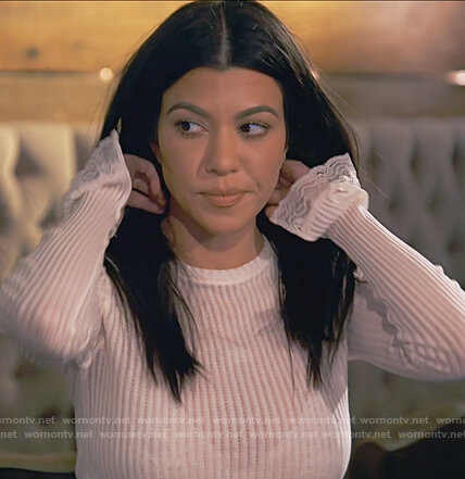 Kourtney’s white lace-cuff top on Keeping Up with the Kardashians