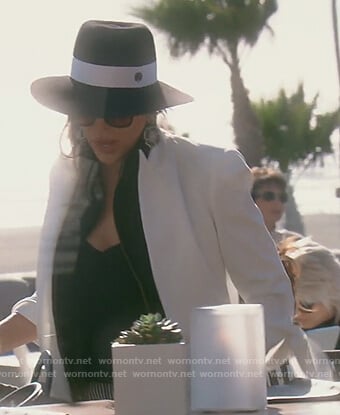 Kelly's white tie sleeve jacket on The Real Housewives of Orange County