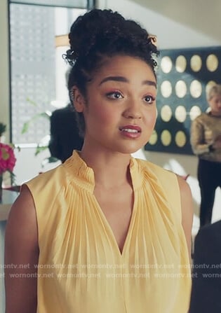 Kat's yellow pleated front top on The Bold Type