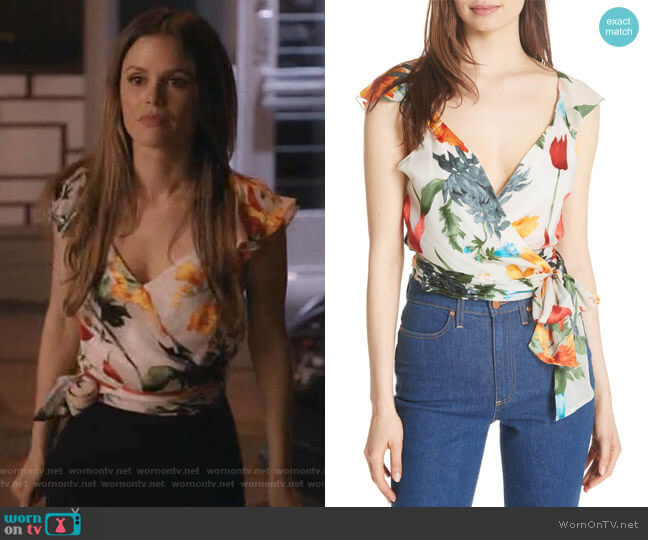 Sam’s floral wrap top on Take Two