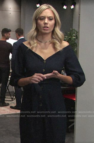 Abby’s navy off-shoulder jumpsuit on The Young and the Restless