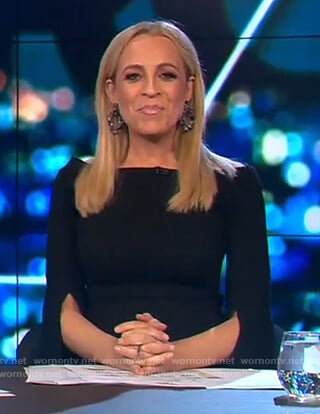 Carrie's black off shoulder split cuff dress on The Project